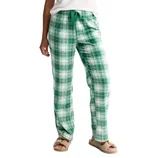 Green plaid pajama pants with a drawstring waist, paired with fuzzy beige slippers.