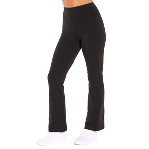 Black high-waisted, flared yoga pants with white athletic shoes.