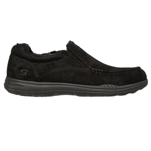 Black suede slip-on Skechers slippers with a visible logo, featuring a padded collar and a cushioned, flexible sole for comfort.