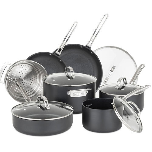 A cookware set includes various pots and pans with lids and a steamer insert, featuring a non-stick surface and polished handles.