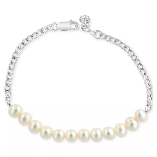 A bracelet with nine cream-colored pearls set on a silver chain, featuring a clasp closure.