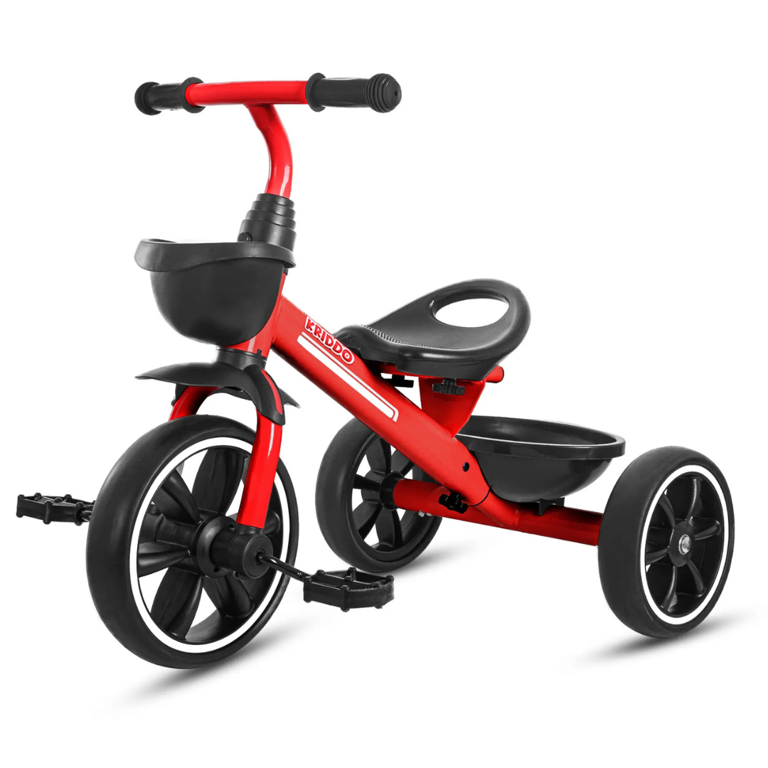 Red children's tricycle with black handles and seat, featuring a front basket and rear storage area.