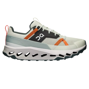On running shoe with a white and gray upper, orange accents, and unique cloud-like cushioning in the sole.