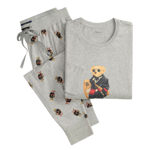 Grey Pajama set featuring iconic teddy bear designs, with a top displaying a bear in sunglasses and a coordinated pattern on the pants.