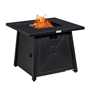 A square outdoor gas fire pit table with a black base and top, featuring decorative paneling and visible flames at the center.