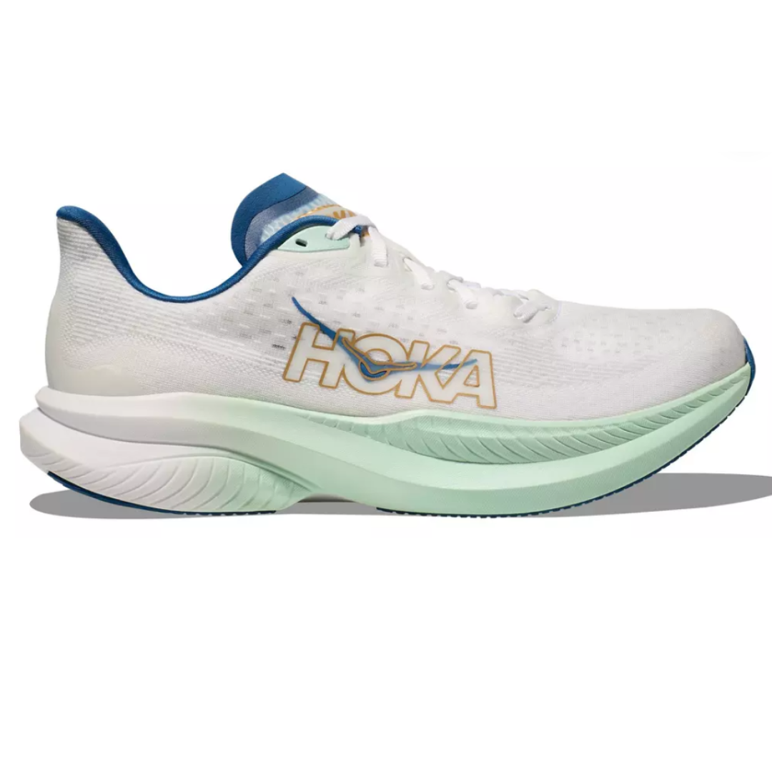 Hoka Mach 6 Running Shoes feature a white mesh upper with blue and gold accents, a thick cushioned sole in a gradient of mint green to white, and the Hoka logo prominently displayed on the side.