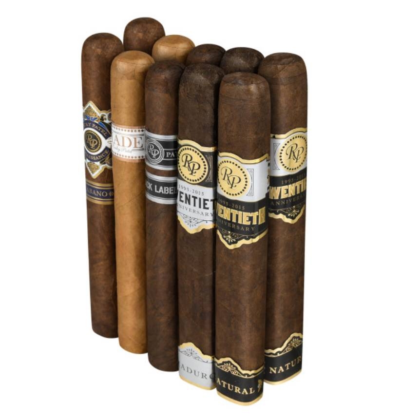 A collection of cigars with various labels, including \“RP\“ and \“Decade,\“ indicating different brands or editions.