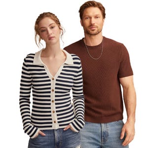 A woman wearing a navy and white striped cardigan and a man in a brown short-sleeve sweater, both paired with blue jeans, are standing side by side.