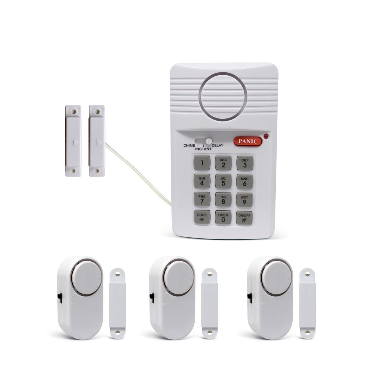 A home security system with a keypad, door sensors, and alarm units. The components include a keypad with a panic button and switch settings, and several wireless magnetic door/window alarm sensors.