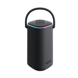 A portable Treblab Bluetooth speaker with a cylindrical shape, fabric exterior, top handle, and LED light ring around the top edge for illumination or decoration.