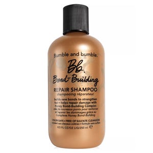 Bumble and bumble Bb. Bond-Building Repair Shampoo, 8.5 fl oz (250 ml), strengthens and repairs hair with a Honey Bond-Building Complex. Sulfate-free and color-safe.