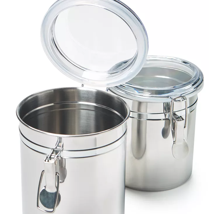 Two stainless steel canisters with clear, airtight clamp lids.