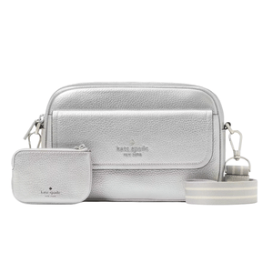 A metallic silver Kate Spade leather crossbody bag features a front flap pocket, and comes with a matching small pouch. It includes a detachable striped shoulder strap and a mini coin purse attachment.