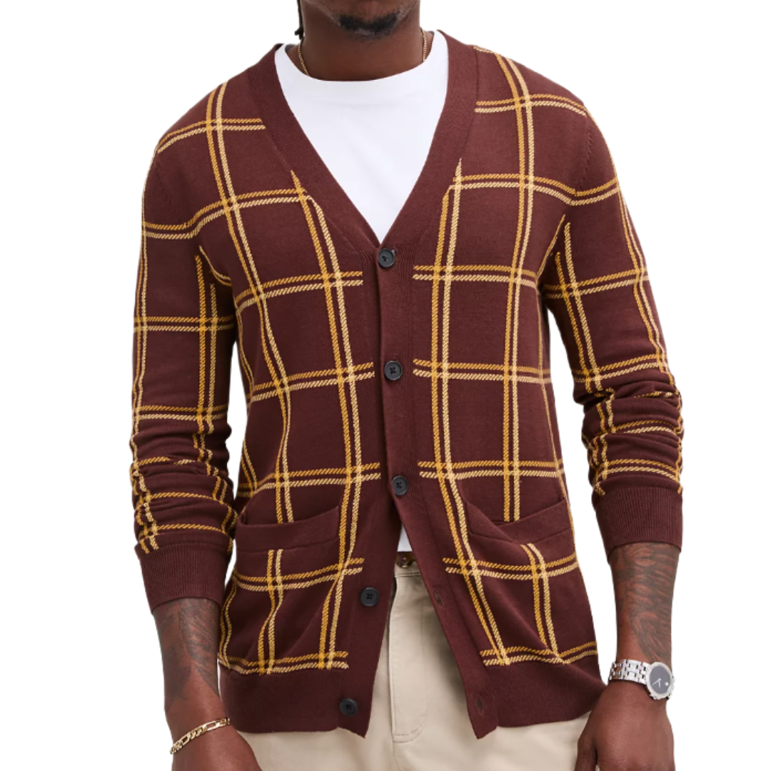 A maroon cardigan with yellow plaid pattern, featuring long sleeves, black buttons, and two front pockets, worn over a white T-shirt with beige pants.