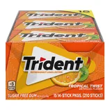 Box of Trident Tropical Twist sugar-free gum, featuring 15 packs with 14 sticks each, totaling 210 sticks. Includes flavors like orange, kiwi, and strawberry, with less than 5 calories per piece.
