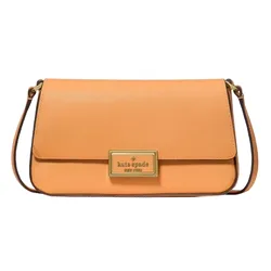 An orange Kate Spade New York shoulder bag with a rectangular gold logo plate on the front flap.