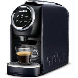 Lavazza espresso machine with a sleek, modern design, features two touch buttons labeled \“Lungo\“ and \“Espresso,\“ dispensing freshly brewed coffee into a glass cup placed on the drip tray.