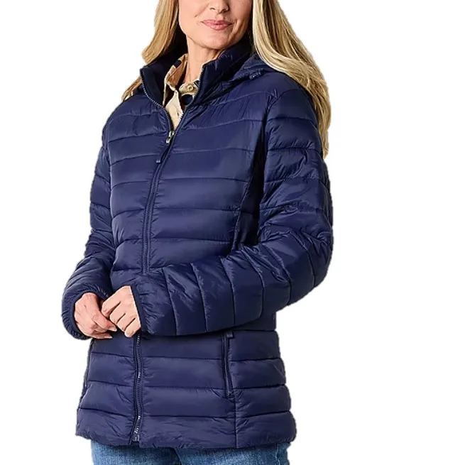 A navy blue puffer jacket with a hood, featuring horizontal quilted stitching, a front zipper closure, and side pockets. The jacket is paired with blue jeans and has a casual, comfortable design.