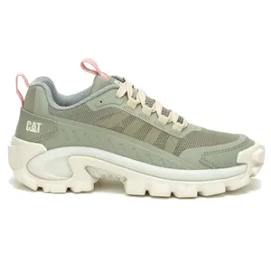 A light green sneaker with a rugged sole, branded with \“CAT,\“ features pink accents and beige laces, designed for casual wear.