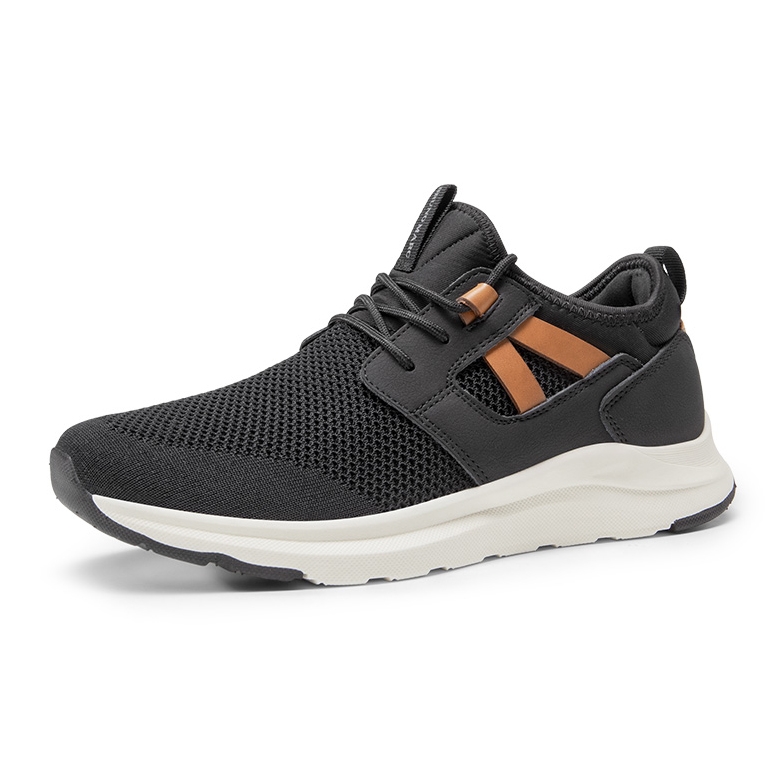 Black slip-on walking shoes featuring a breathable mesh upper, brown accents, and a white cushioned rubber sole for comfort.