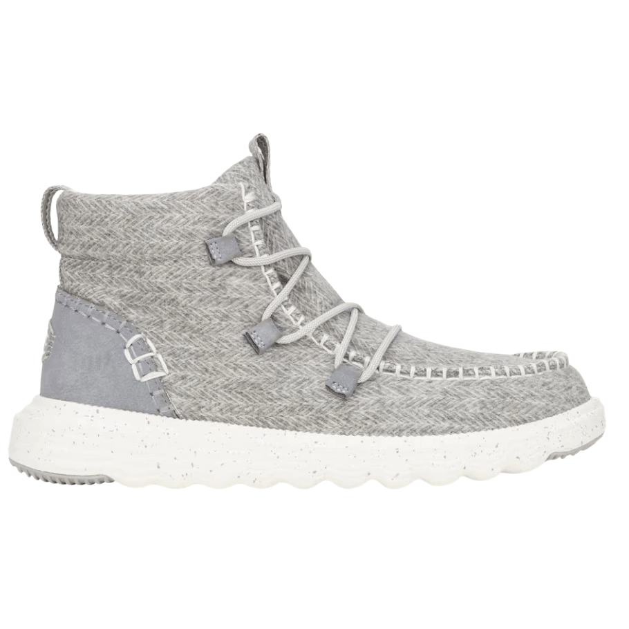 A gray high-top sneaker with a textured, woven fabric design, featuring crisscross laces and a white speckled sole.