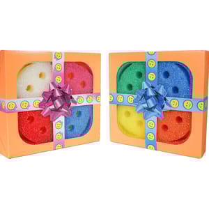 Two gift sets contain colorful smiley face sponges in orange boxes with a smiley-themed ribbon and a decorative bow. Each box displays four sponges in various colors: white, red, green, yellow, orange, and blue.