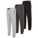 A set of three pairs of joggers in light gray, dark gray, and black, all featuring an elastic waist with drawstrings and zippered side pockets.
