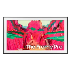 A digital display with an art piece featuring vibrant pink and green landscapes. The text \“The Frame Pro\“ is visible on the screen.