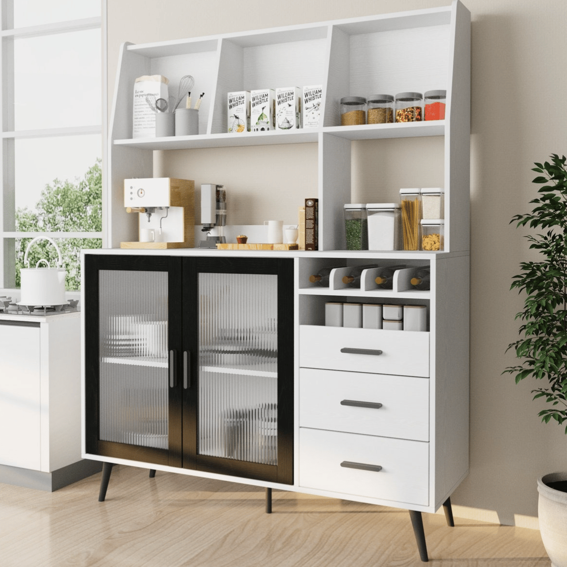 Modern kitchen cabinet with open shelves, drawers, and frosted glass doors. Contains a coffee machine, jars, and containers for organized storage.