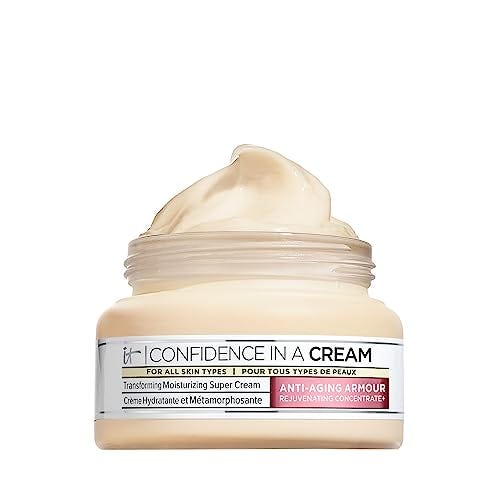 A jar of It Cosmetics Confidence in a Cream is open, showing its white, creamy content; labeled for all skin types and anti-aging.