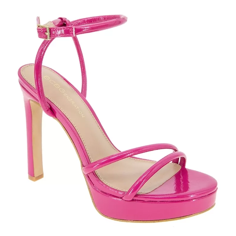 A pink high-heeled sandal with an ankle strap and platform sole.
