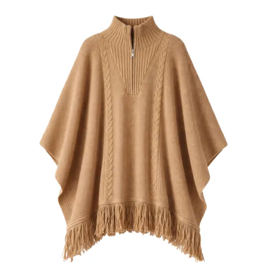 A camel-colored poncho featuring a cable knit design, high collar with a partial zip, and fringed hem.
