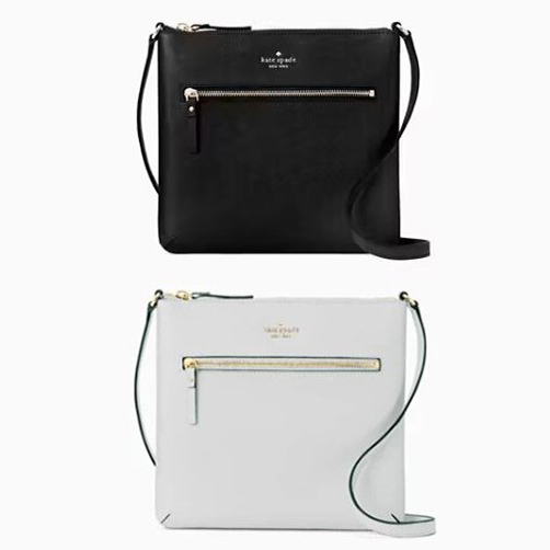 Two Kate Spade crossbody bags, one in black and one in white, both with front zip pockets.