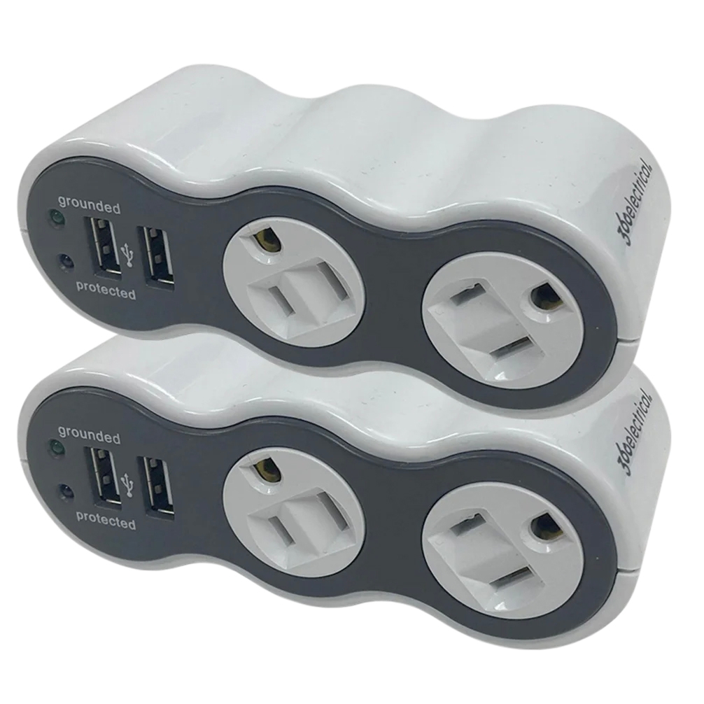 Stacked surge protectors with two USB ports and three power outlets each, labeled \“grounded\“ and \“protected\“.