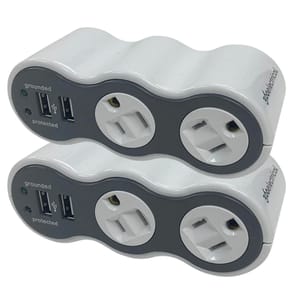Stacked surge protectors with two USB ports and three power outlets each, labeled \“grounded\“ and \“protected\“.