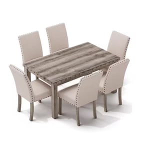 A dining set featuring a rectangular wooden table with a weathered finish and six beige upholstered chairs, each adorned with nailhead trim.