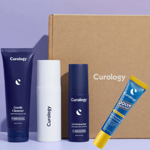 Curology skincare set with Gentle Cleanser, Custom Formula bottle, Gel Moisturizer, and a limited edition Jolly Rancher Blue Raspberry Lip Treatment.