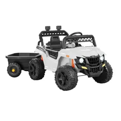 A white ride-on toy vehicle for children resembling an off-road utility vehicle, featuring four large wheels, a black seat, headlights, and a detachable black trailer for towing.