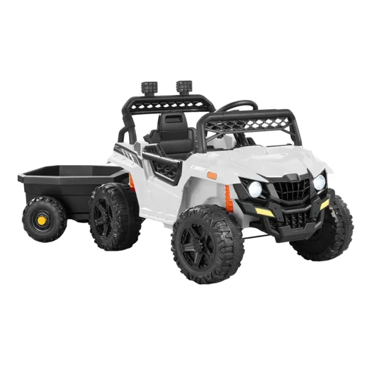 A white ride-on toy vehicle for children resembling an off-road utility vehicle, featuring four large wheels, a black seat, headlights, and a detachable black trailer for towing.