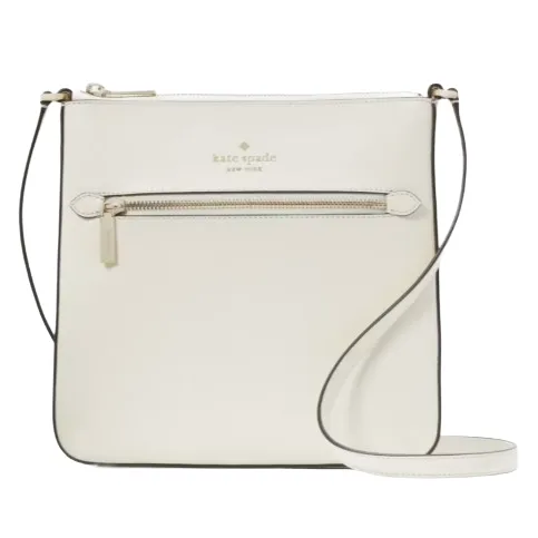 A white Kate Spade New York crossbody bag featuring a slim design, front zipper pocket, and adjustable strap.