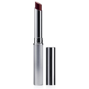 A sleek silver lipstick tube with a dark red shade, featuring a slim, modern design and a separate cap placed beside it.