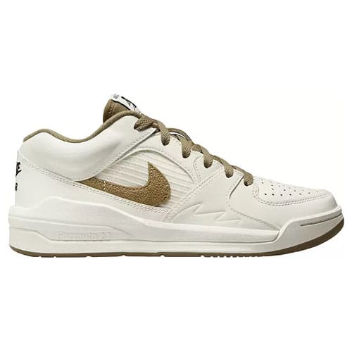 White sneaker with gold accents and a zigzag pattern across the side.