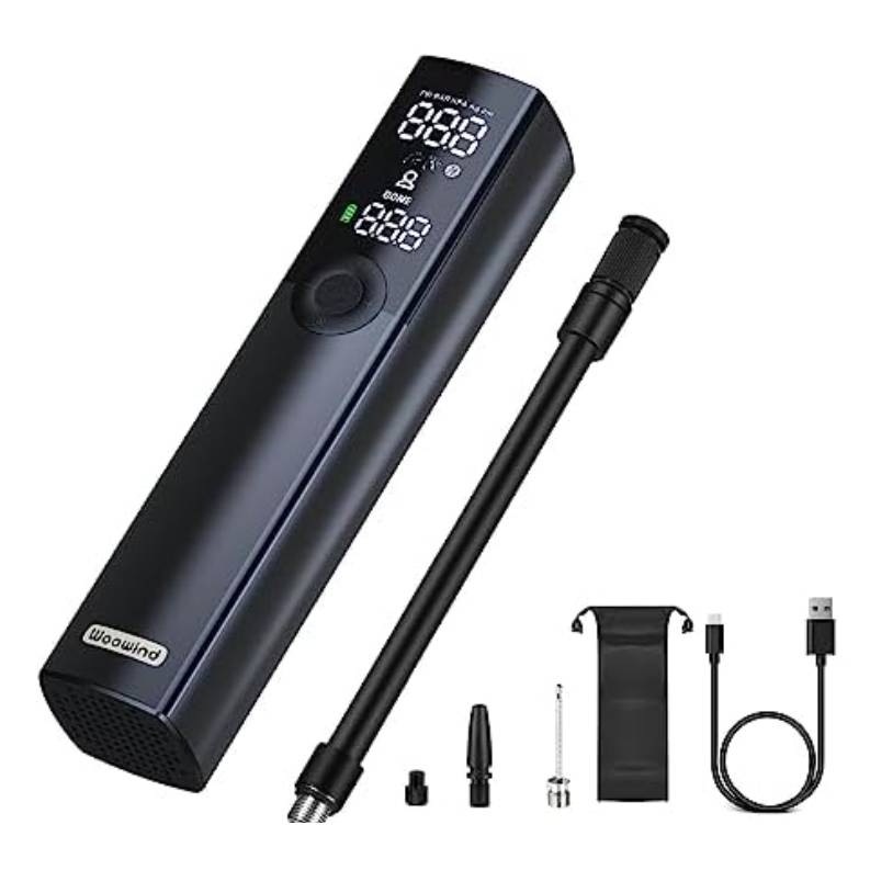 Portable electric air pump with digital display, extension hose, various nozzles, USB charging cable, and carrying pouch. Suitable for inflating tires and sports equipment.
