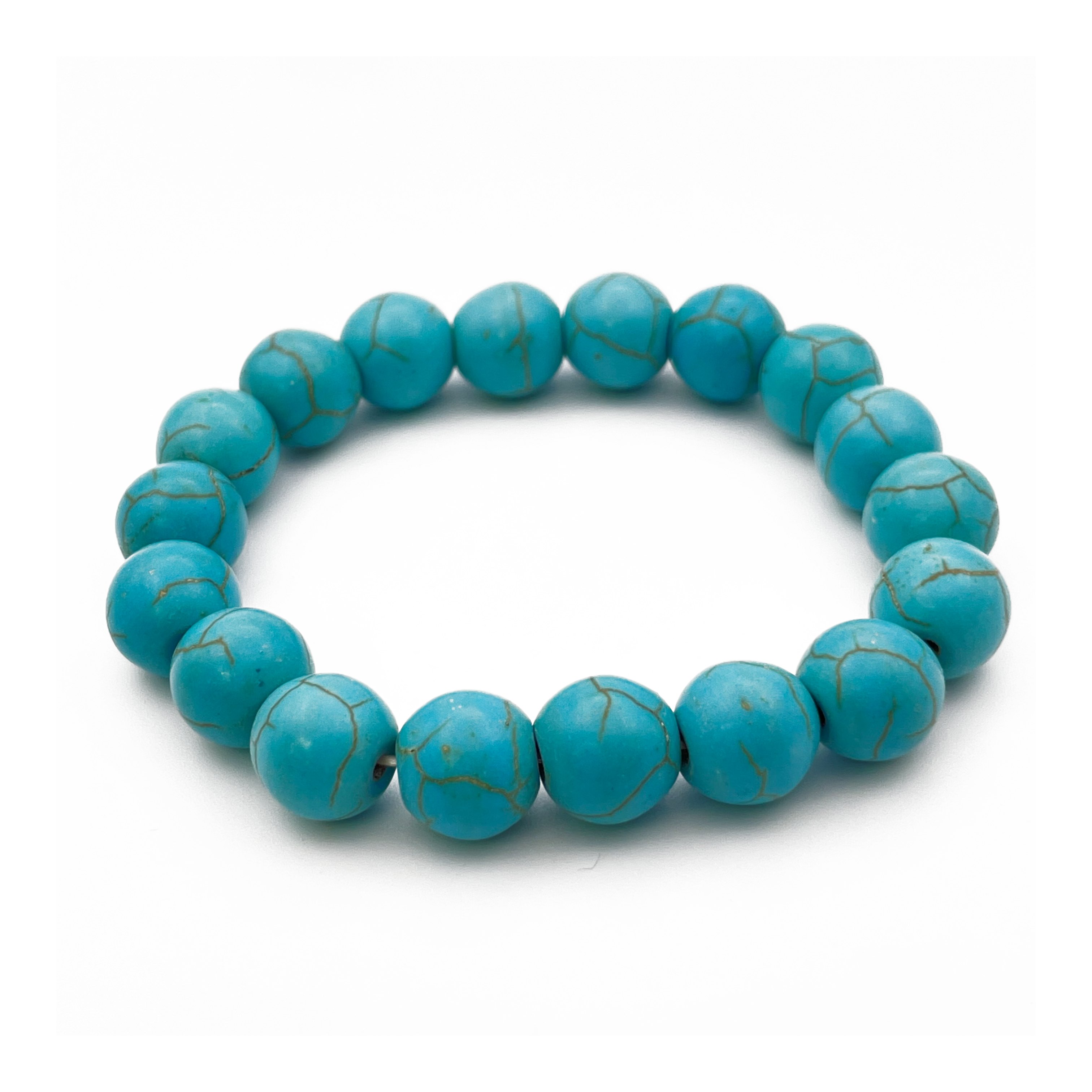 A bracelet made of round blue-green turquoise beads with visible marbling, strung together to form a complete circle.