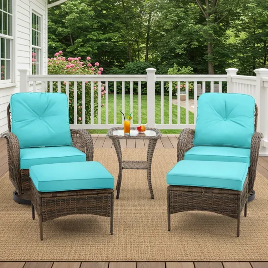 Outdoor patio set with two wicker chairs featuring turquoise cushions, matching ottomans, and a small wicker side table.