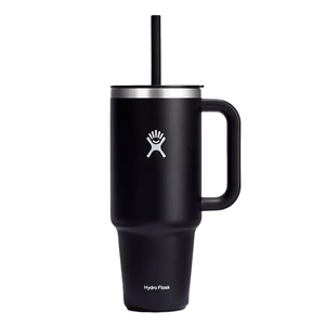 Black Hydro Flask travel mug with a handle and straw, featuring the brand's logo.