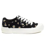 Black sneakers with daisy patterns, white laces, and a thick white sole.