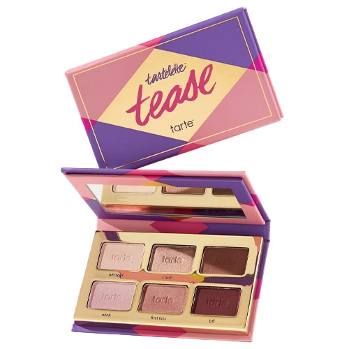 Tartelette Tease by Tarte is a compact eyeshadow palette featuring six shades in a mix of matte and shimmer finishes, housed in a purple and pink geometric-patterned case with a mirror.