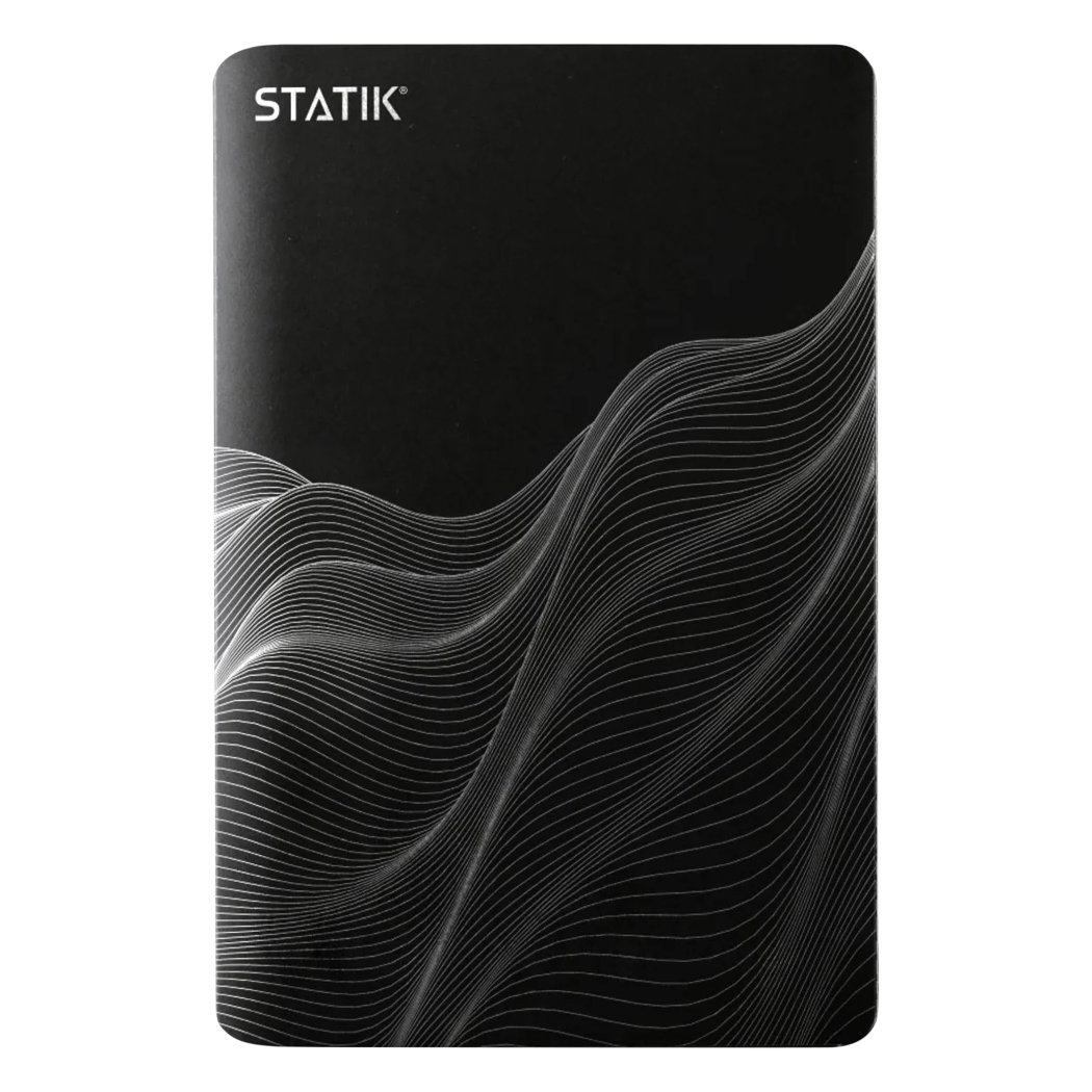 Black 65W power bank with white wave-like line design and the brand name \“STATIK\“ on the top left corner.