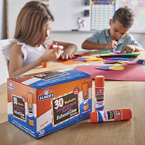 A box of 30 Elmer's Washable Disappearing Purple School Glue Sticks is displayed alongside two sticks, with children crafting in the background.